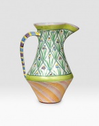 A verdant garden patio piece is handcrafted and individually painted with tall flowers and sherbet-hued stripes by master ceramics artisans. For an especially one-of-a kind touch, each piece bears the hand-placed stamps of the artisans who created it. Dishwasher- and microwave-safe 12-ounce capacity 12H X 7½ diam. Made in USA