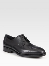 Classic captoe lace-up expertly crafted in Italy from smooth calfskin leather with perforated detail and a comfortable rubber sole.Leather upperLeather liningPadded insoleRubber soleMade in Italy