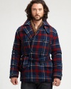 Rugged meets refined in this warm double-breasted coat, crafted from sumptuous Italian wool and accented with multiple pockets and a classic plaid pattern for enduring cold-weather style.Button-frontChest welt, waist flap pocketsSelf-tie waist beltFully linedAbout 33 from shoulder to hem80% wool/20% nylonDry cleanImported