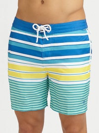 A quick-dry look with a colorful melange of printed stripes revive a classic beach style. Drawstring waistBack flap pocketsMesh liningInseam, about 6PolyesterMachine washImported 