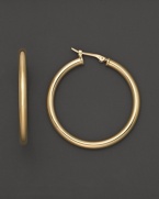 Simply chic, these 14K. yellow gold hoops are timeless classics.