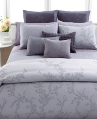 A peaceful setting! Journey off to sleep surrounded by this Vera Wang Trailing Vines duvet cover, featuring a muted floral pattern. Button closure.