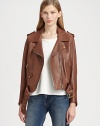 Buttery lambskin leather jacket with motorcycle-inspired details and major it-girl vibes. Notched collarSnap closuresEpauletsLong sleeves with zip cuffsFront zipperZippered slash pocketsFlap pocketsBelted hemAbout 21 from shoulder to hemLeatherDry clean with leather specialistImportedSIZE & FITModel shown is 5'10 (177cm) wearing US size Small. 