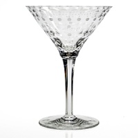 Made entirely from hand, each piece of William Yeoward Crystal draws its inspiration from antique crystal pieces originally made in England during the 18th and early 19th centuries. Here, a design from 1790 is still unbelievably contemporary with decorative matte and polished bubbles adorning a mod martini glass.