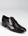 A sleek, sophisticated cap toe oxford shoe crafted in soft Italian leather.