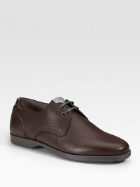 A two-eyelet derby style designed in pebbled calfskin leather. Leather lining Padded insole Rubber sole Made in Italy 