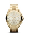 Get it right on or off the clock with this substantial Michael Kors watch, which features an effervescent dial, surrounded by a plated gold face.