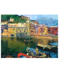 Crafted with an Impressionist's eye, Vernazza evokes all the color and charm of Italy's Cinque Terre region for a touch of European splendor. Brightly painted houses built into the hillside welcome home a fleet of fishermen. Gallery-wrapped canvas completes the piece with contemporary style. By Jerry Blank.