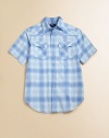 A plaid cotton poplin shirt is crafted for an authentic Western look in a short-sleeved silhouette.Straight point collarShort sleevesButton frontReinforced crested front and back yokeSnap-patch pocketsRounded shirttail hemCottonMachine washImported Please note: Number of buttons may vary depending on size ordered. 