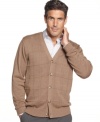 Bring classic style to any look with this textured cardigan sweater from Oscar de la Renta.