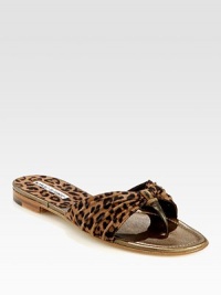 Butter-soft suede takes on an exotic leopard print in this comfortable basic with shimmery metallic leather trim. Suede upper with metallic leather trimMetallic leather liningLeather solePadded insoleMade in Italy