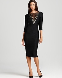 Wavy ribbing lends a textured look to this Mark + James by Badgley Mischka dress. The fitted silhouette exudes subtle sparkle with a sequin-detailed illusion neckline.