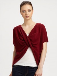 This v-neck, twist-front cashmere topper is perfect for snuggling luxuriously.CashmereShort sleevesPullover styleHand wash or dry cleanImported