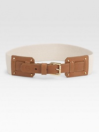 A wide, stretchy design with supple leather and a goldtone metal buckleWidth, about 2Made in USA