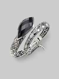 From the Jewels Verne Collection. A coil of crosshatched sterling silver with a faceted grey cat's eye and quartz stone.Cat's eye Quartz Sterling silver Diameter, about 2½ Imported 