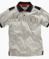 Shoulder epaulets and double chest pockets on this polo shirt from Sean John give his look some muscle.