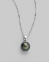 From the South Sea Collection. Elegantly simple with a black, round cultured South Sea pearl hanging from a chain of 18k white gold. 9mm black round cultured pearl Quality: A+ 18k white gold Length, about 18 Spring ring clasp Imported