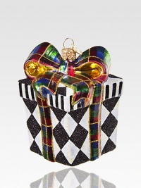 Harlequin diamonds shimmer and shine in this glittering package of mouth-blown, hand-painted glass, all tied up with a bright tartan bow.Glass3.5H X 2.5 squareImported Please note: Due to their handmade nature, ornaments may vary slightly. 