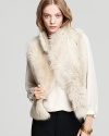 Cozy up to one of our most glamorous looks of the season and invest in a vest.