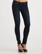 Body-skimming stretch denim finished in an ultra-chic dark rinse.Mid-rise waist Zip-fly Five-pocket style Inseam, about 31 69% rayon/29% cotton/2% polyuretahne Machine wash Made in USA of imported fabric