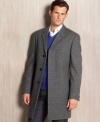 Calvin Klein takes a man's topcoat and pares it down to the absolute essentials-taking off the extra pockets, hiding the button closure under a concealing placket. Leaving you only with the warmth of wonderful wool/cashmere coating tailored into a long, lean (and flattering) line.