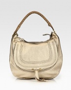 EXCLUSIVELY AT SAKS in Metallic Beige. A slouchy silhouette in frosted metallic calfskin leather, finished with a signature tennis-wrapped handle. Top handle, 8 dropTop zip closureHidden open pocket under flapOne inside zip pocketOne inside open pocketCotton lining15¾W X 15H X 5DMade in Italy