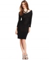 A sprinkle of sequins add sparkle to this GUESS dress, perfect for holiday soiree style!