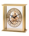 Watch as the gears shift inside this revealing tabletop clock by Bulova. A brass-finished metal frame houses a floating gold tone skeleton dial with black Roman numerals and two hands.