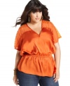 Getting standout style is a cinch with Baby Phat's plus size top, featuring embellished sleeves! (Clearance)