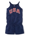 A red, white and blue design with USA patching gives a preppy, all-American look to a pretty warm-weather romper in celebration of Team USA's participation in the 2012 Olympics.