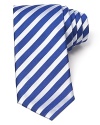 Bright white grosgrain stripes race across a classic silk tie from BOSS Black.