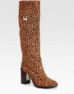 Leopard-print calf hair in a knee-high silhouette with goldtone buckle hardware and a partially lacquered heel. Stacked, lacquered heel, 3½ (90mm)Shaft, 16Leg circumference, 14Leopard-print calf hair upperLeather liningLeather and rubber solePadded insoleImportedOUR FIT MODEL RECOMMENDS ordering one half size up as this style runs small. 