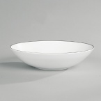 Jasper Conran continues to close the gap between formal dining and casual living. He accents the contemporary beauty of his already popular white bone china range with a touch of formality in the forum of a thin platinum band. To create an interplay of proportions, accent pieces including a plate, a charger, a small pitcher, mug, teacup and saucer, use thick platinum stripes to reinforce the pattern's look of sophisticated elegance.