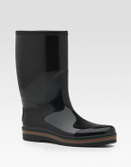 Rubber rain boot with signature trim and interlocking G on back.Rubber upperRubber soleMade in ItalyPlease note: For best fit please size down one full size.