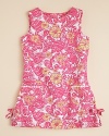 A sunny look from Lilly Pulitzer, this classic shift dress is rendered in bold florals, with bow accents at the side and front pockets with ric rac trim.