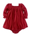 An adorable dress is crafted from plush velour for an ultra-soft feel, perfect for holiday festivities.