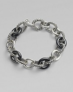 From the Chain Collection. A trinity of signature cable, plain, and black ceramic oval links.Ceramic Sterling silver Length, about 7½ Lobster clasp closure Imported 