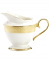 A classic introduced in 1915, Westchester dinnerware features an opulent gold border with etching that evokes the grandeur of another era. Master artisans achieve a lustrous glow in the elegant creamer, handcrafted in ivory china with sumptuous banding.