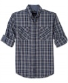 Get ready to roll up your sleeves: Calvin Klein Jeans styles its Mesa plaid sports shirt with button-through sleeve tab in a coordinating contrast fabric.