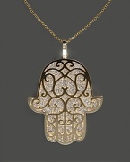 Diamond Hamsa pendant necklace in yellow gold.