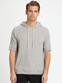 Sporty, hooded pullover perfect for casual weekend wear, in finely blended cotton knit for added warmth and comfort.Attached drawstring hoodFront kangaroo pockets95% cotton/5% polyurethaneMachine washImported