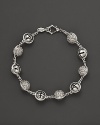 Inspired by Zen philosophy, this intricately detailed sterling silver bracelet from Paul Morelli softly jingles with meditation bells.