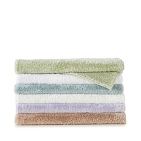 The Allure bath rug from Christy features an innovative new fabric that looks like cotton but has increased durability and dries more quickly--with a skid resistant backing, this rug is stain resistant and bleach friendly (not to mention the color won't fade after washing).