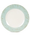 Sculpted blooms and a classic silhouette make the Toulouse dinner plates by Fitz and Floyd a charming part of any casual landscape. A rustic green glaze adds to its antique appeal.