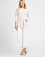 Intricate crochet meets a luxurious combination of cotton and silk to create the quintessential sweater, with a bohemian, braided belt.BoatneckThree-quarter sleevesBraided, self-tie beltAbout 24 from shoulder to hem79% cotton/18% viscose/3% silkDry cleanImported Model shown is 5'10 (177cm) wearing US size Small. 