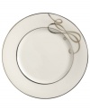 Sweet yet sophisticated, a loopy ribbon design sweeps across this porcelain bread & butter plate from Mikasa. Complete with a sparkling platinum rim, this flirty pattern captivates everyone at your dinner table.