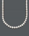 Duplicate the look of sophisticated style icons Audrey Hepburn and Jackie Onassis with a simple strand of pearls. Belle de Mer's chic necklace features smooth AAA cultured freshwater pearls (8-1/2-9-1/2 mm) set in 14k gold. Approximate length: 18 inches.