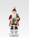 A gorgeously detailed vintage Santa wears rich robes with glitter, beaded textures and intricate patterns, all crafted of mouth-blown, hand-painted glass, an exquisite heirloom for your tree.Glass6.5H X 3W X 2.5DImported