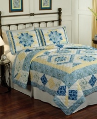 This Temperance Lane quilt set features graceful blossoms and a beautifully quilted diamond design for a delicate appeal. A blue, white and pale yellow palette gives the set a soothing quality.