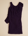 Leaving one shoulder bare, a gently cascading ruffle runs from shoulder to hem on Un Deux Trois' elegant Grecian dress.